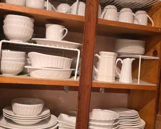 lots of dish sets and canisters 