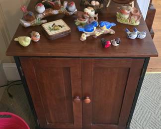 ceramic birds and cabinet 