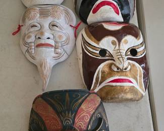 vintage wood and paper mache masks 
