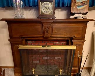 Bulova Mantle Clock; Freestanding Fireplace Mantle; Fireplace Tools; Fireplace Screen; Electric Fireplace Logs; Wooden Photo Album on Stand