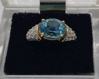 Gold and gemstone ring