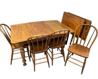 Expandae Table with Four Windsorstyle spindleback dining chairs