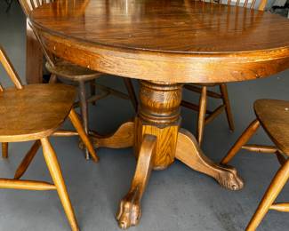 Pedestal/claw oak table with 4 chairs