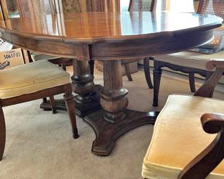 Amish Style Oval Double Pedestal Dining Table with Traditional Cane Back Dining Chairs