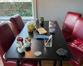 Black Rectangular Dining Table with Red Faux Leather Chairs

