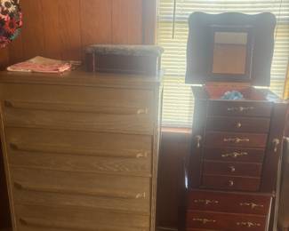 Chest of drawers has matching headboard/footboard. Jewelry armoire