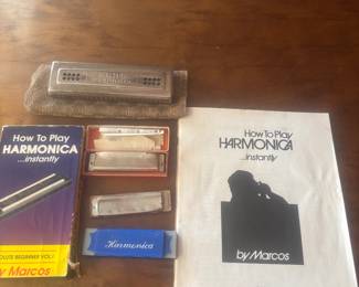 Several harmonicas 