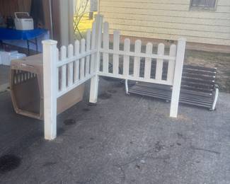 Swing, pet crate and fence