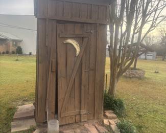 Outhouse. Must be moved by buyer