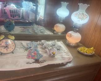 Holly Hobby clock, embroidered piece and child’s tea set. Vintage lamp and miniature yellow tea set