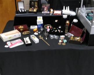 Fashion hand bags (background), vintage plastic bunny egg holders and various items