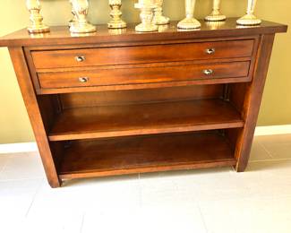 Exceptional console with drawers and shelves