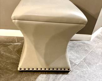 Nailhead trim storage ottoman