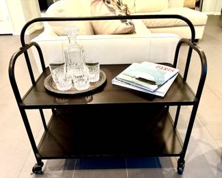 Black metal rolling side table