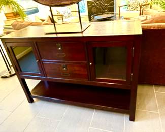 Console with glass pane doors