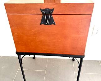 Trunk side table on metal base