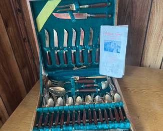 Johnys gems flatware 
Wood and brass