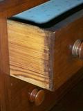 details of secondary wood and dovetails to chest