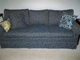 like new Ethan Allen sleeper sofa, medium blue background with leaf design
