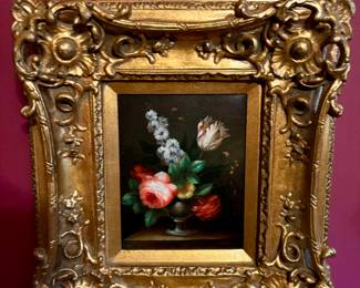 Small painting in very ornate frame