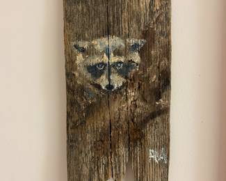 Hand painted raccoon on natural wood