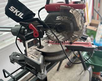 Skil radial arm saw with stand. 