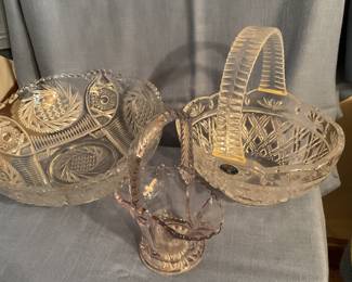 Large selection of crystal and glass pieces including cake stands, pitchers, bowls, trays, decanters, vases and candlesticks