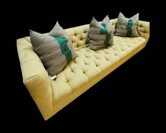 Tufted mustard sofa