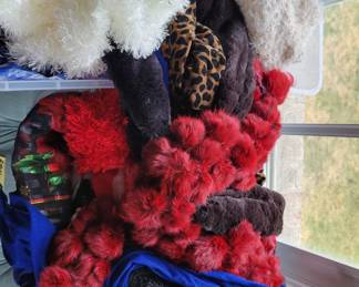 Totes full of scarves.  Many with original tags 