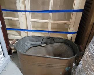 Copper boiler.  Cabinet with glass doors