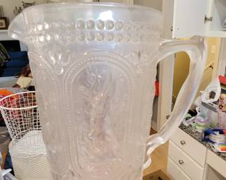 Vintage pitcher with rabbits