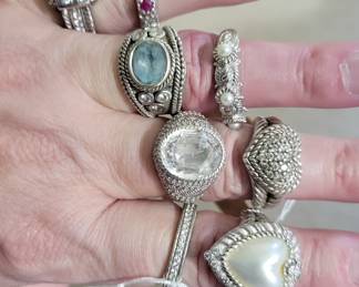 Large assortment of sterling silver and costume rings