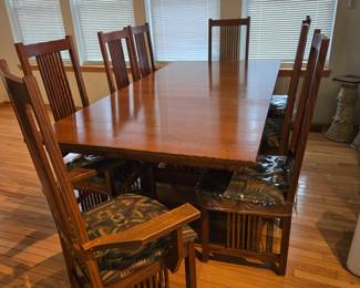 Mission style oak dining table with 8 chairs 2 leaves