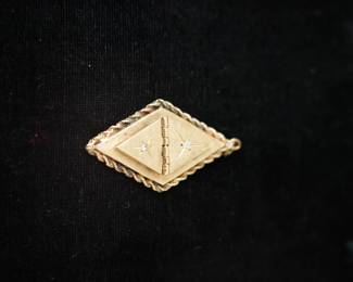 14 KT GOLD LOCKET