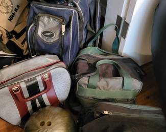 Bowling balls, carrying cases