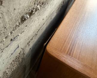 This lot features the Orvar sideboard by Scandinavian Designs. Crafted in teak, this cabinet measures, 29.5” H x 66” W x 20” D. Three large drawers and two cabinets provide ample space for hosting and dining accoutrement.

