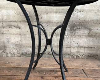 This lot features a Kai Flower mosaic table that measures, 30” H x 28” W x 28” D.

