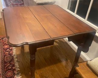 Early American Mahogany (or could be cherry) Federal drop leaf table with twisted carved legs.