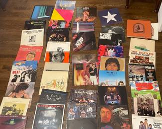 collection of Vintage Vinyl records from 1950-1980. many original recordings. classics like The Beatles, The Clash, Paul McCartney, Neil Young, the Rolling Stones, Boz Scaggs & more. prices range $20-$200