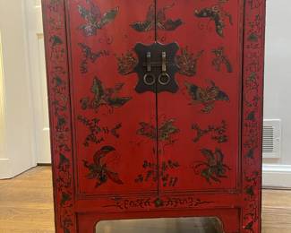 Chinese Red Lacquer chest with hand drawings.