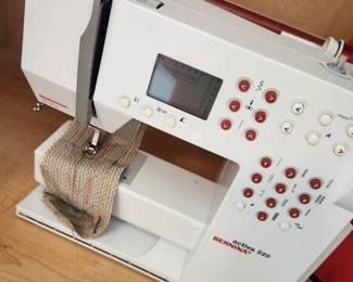 Activa 220 Bernina Portable Sewing Machine with Red Carry Case. 