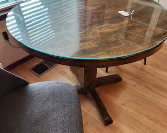Pedestal Table with Glass over Wood Top. Two Modern Grey Chairs. 