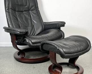 Black Stressless Ekornes Danish Chair and Ottoman. 