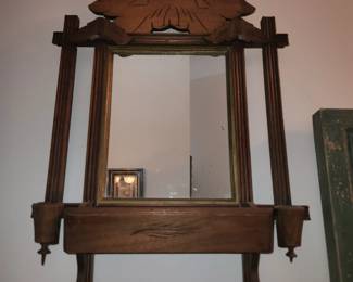 Antique mirror with towel bar