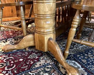 Solid oak dining table - includes 8 chairs and 2 large leaves.