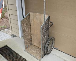 Large wooden wheel barrow