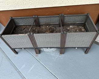 There are 3 planter boxes