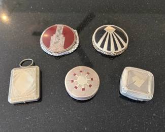 Vintage enameled Evans and other Art Deco compacts