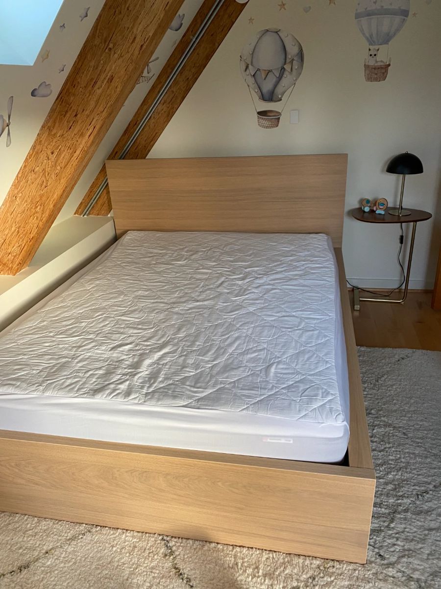 now $50.   Ikea Queen Bed and Mattress. 66"w x 72'd X 40 h 