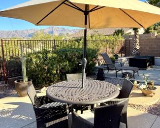 Patio dining with umbrella and 4 chairs